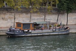 River House Boat Nina docked in the Seine River near Eiffel Tower.jpg