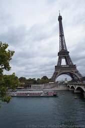 River Boat about to go under Pont d'Lena Bridge Eiffel Tower in the background.jpg