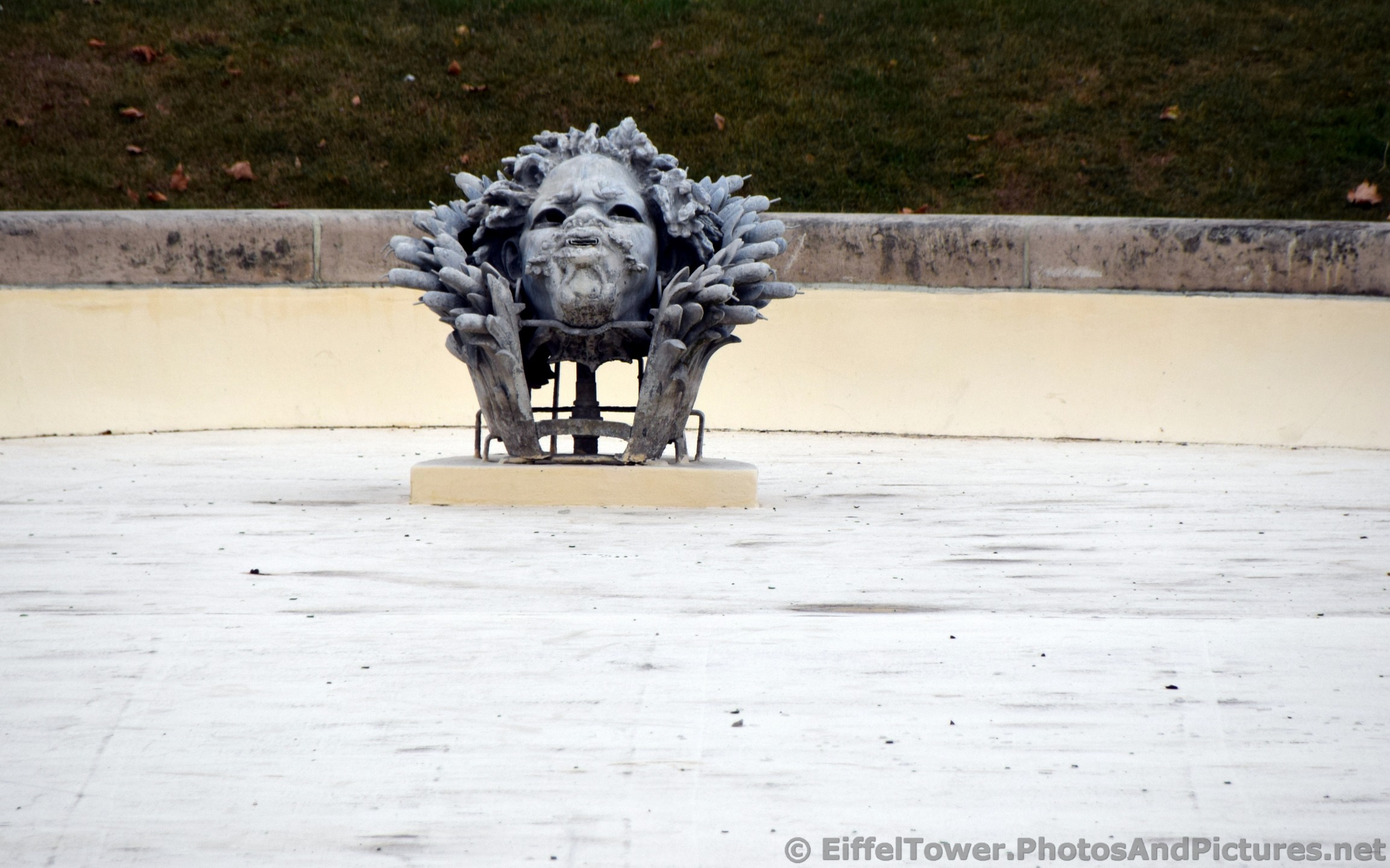 Sculpted Head at the Place Jacques Rueff Fountain.jpg
