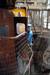 Eiffel Tower Elevator Enginner Sculpture outside of a Lift.jpg