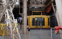 Yellow Eiffel Tower Elevator Arrives on the Second Floor.jpg