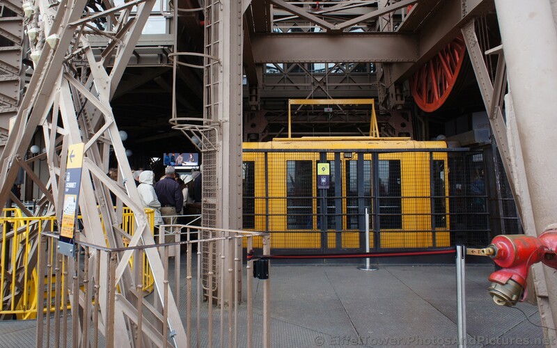 Yellow Eiffel Tower Elevator Arrives on the Second Floor.jpg