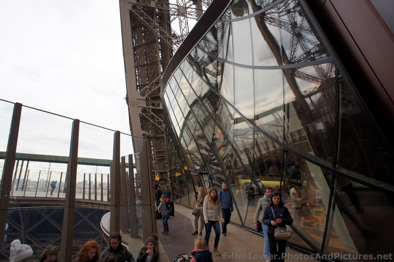 Curved Glass Walls of Eiffel Tower First Level.jpg