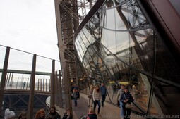 Curved Glass Walls of Eiffel Tower First Level.jpg