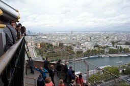 Tourists taking photographs from Eiffel Tower 2nd Level.jpg