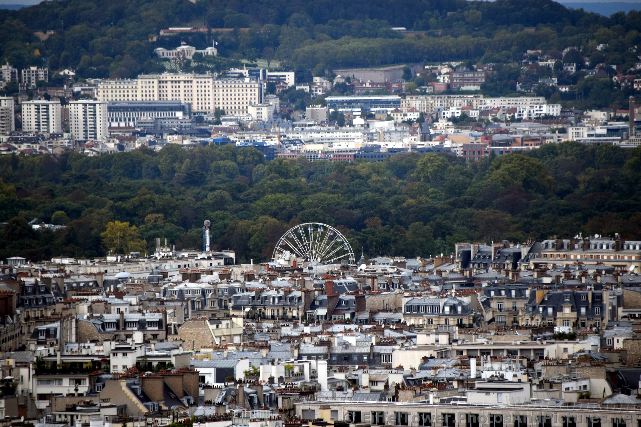 Paris Ferris Wheel and Suresnes France seen from Eiffel Tower.jpg