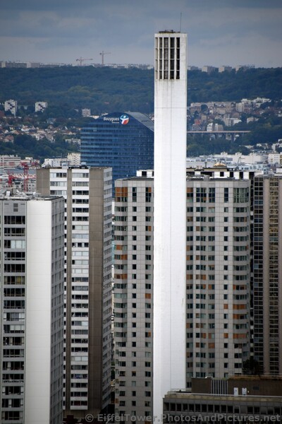 Skinny White Tower of Paris seen from Eiffel.jpg