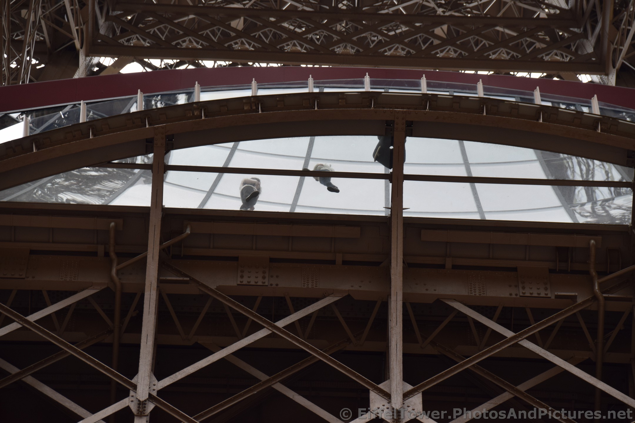 Guests walking on transparent glass on Level One of Eiffel Tower.jpg
